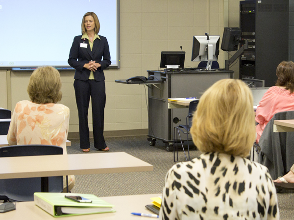 Dr. Kim Hoover, dean of the School of Nursing, addresses the first meeting of fellows and mentors of the SON/IQH Fellowship.