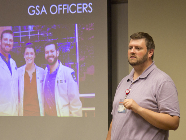Third-year medical student Brent Necaise, co-president of GSA, explains the organization's goals, during the Aug. 26 alliance meeting.