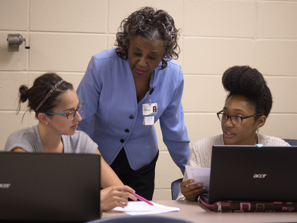 Northington said she sets high standards for her students because nurses have the responsibility of another person's life in their hands. She is pictured here with students in the accelerated nursing class, Taylor-Alice WcWllams, left, and Courtney Swhoops.