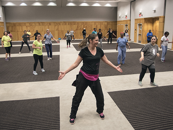Assistant professor of nursing Josie Bidwell (pictured foreground) and Beth Ammons, a registered nurse and patient navigator in pediatric neurology, are leading campus Zumba classes as part of the Medical Center’s emphasis on wellness.