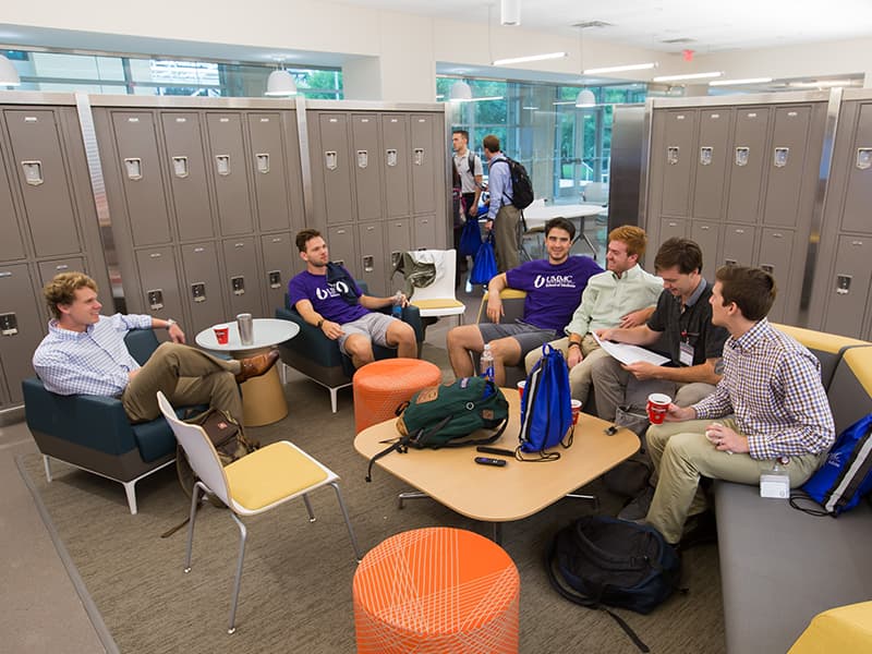 First-year medical students and their second-year prefects get acquainted and comfortable in the new School of Medicine's student lounge area.