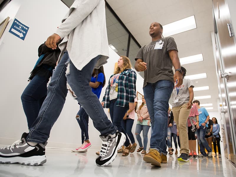 Radiation Science students swarm through the Rowland Medical Library during their first week of orientation.
