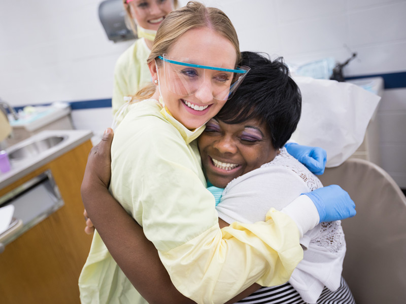 Mary Linda Remley, a dental student, is pictured with her patient, Jackie Epps, of Jackson.