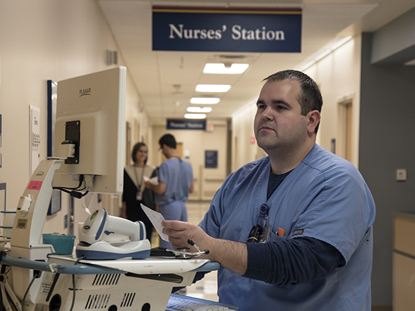 Cory Coleman has continued to work as a nurse in the Adult Hospital while completing his medical school education.