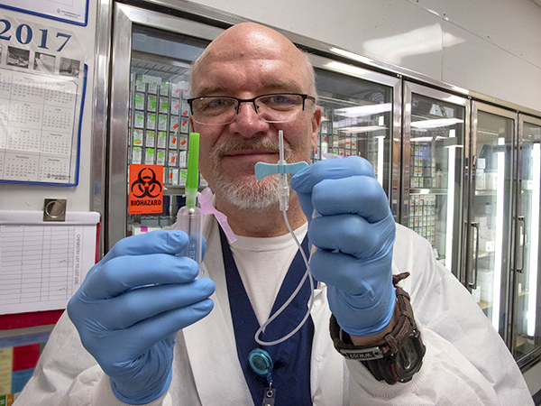 Hankins suggested the Medical Center use a straight needle (left) instead of a more expensive butterfly needle.