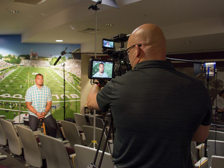 Brian Utley, video producer with the MSU Extension Service Agricultural Communications, records one of the public service announcements featuring Prescott.