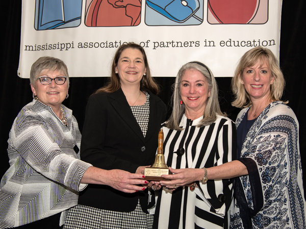 SON faculty, from left, Fouquier, Bidwell, Harris and Norwood, receive the Governor's Award.