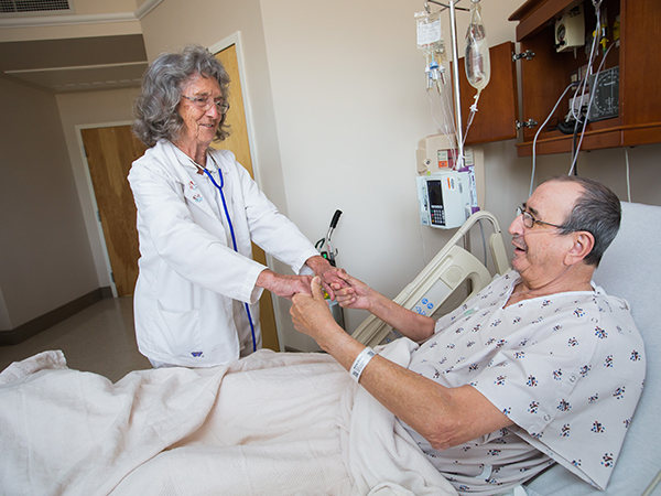 Cooley assesses patient Rickey McKay of Ackerman.