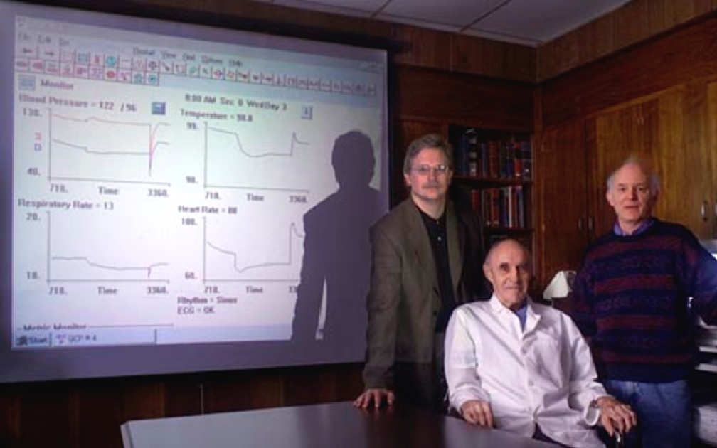 In this 2002 photo, Summers, left, is shown with his  legendary colleagues, Dr. Arthur Guyton, center, and Dr. Thomas Coleman, who together designed a model of integrative human physiology.