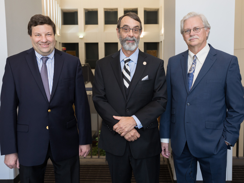 Silver medallion winners from Dr. Damian Romero, left, and Dr. Rob Rockhold with Summers. Not pictured: Dr. Joseph Maher, Dr. Michael Puskarich and Dr. Angela Subauste.