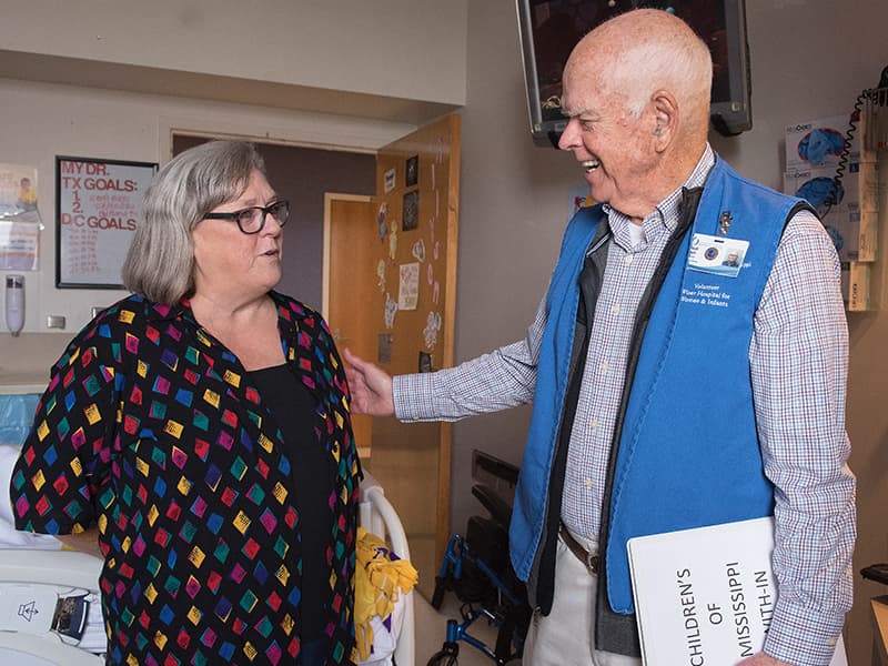 Bailey talks with Sandra Stamper of Decatur at Batson Children's Hospital, where Stamper's granddaughter, Allyson Gressett, is a patient.