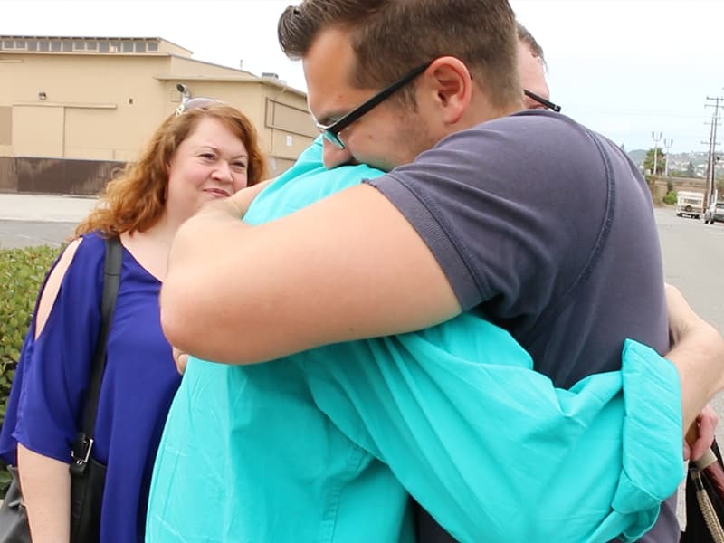 Caleb and Torrey hug after the after meeting for the first time. (Photo courtesy Alex Kimura.)