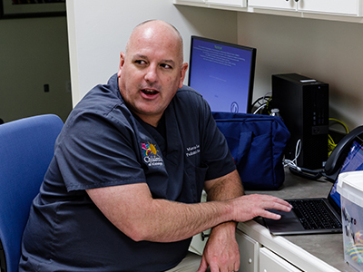 Dr. Mark Lee, a pediatric neurologist, sees patients each Monday at the clinic in Hattiesburg.