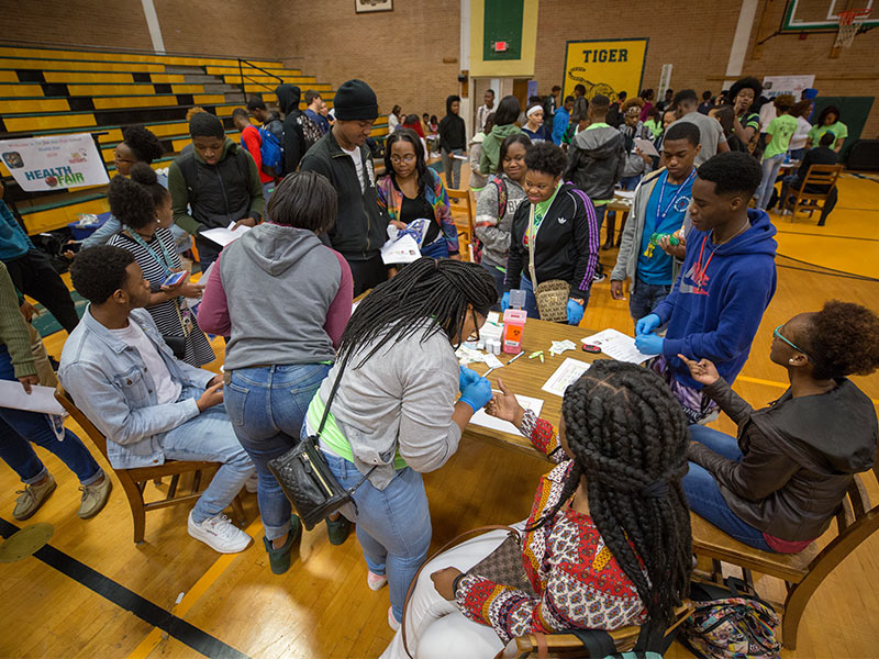 Glucose testing was offered by Jim Hill High Health Academy students to their classmates during a wellness fair.