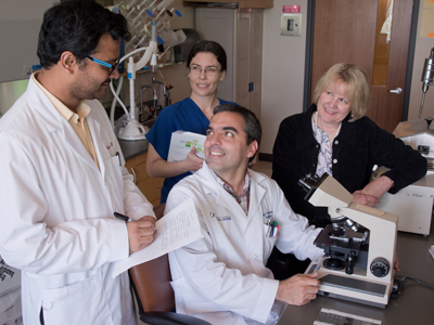 Reckelhoff with current and former postdoctoral fellows Drs. Chetan Patil, left, Rodrigo Maranon and Carolina Dalmasso.