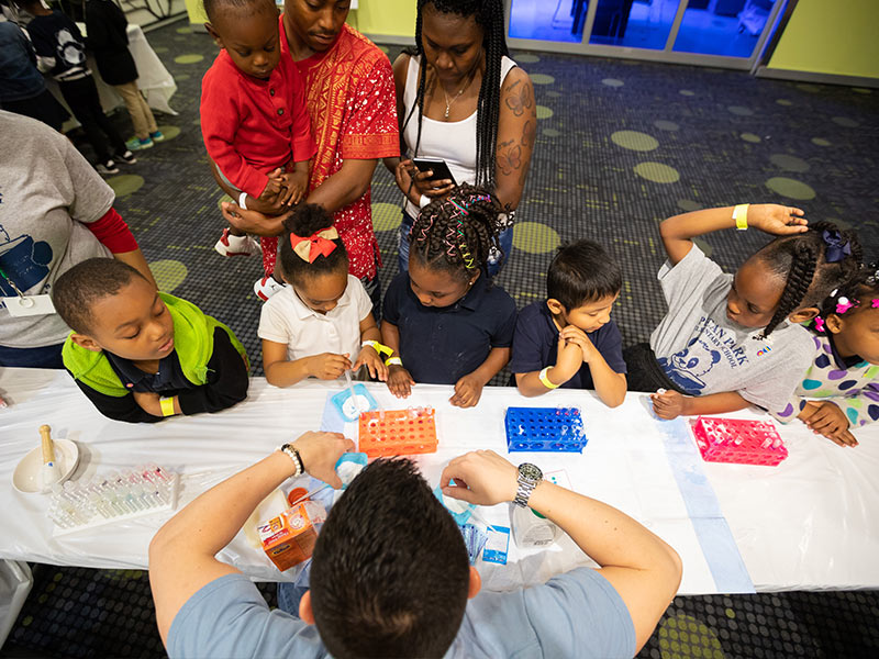 Pecan Park Elementary kindergarteners learn how different kinds of antacids work at Discovery U Day.