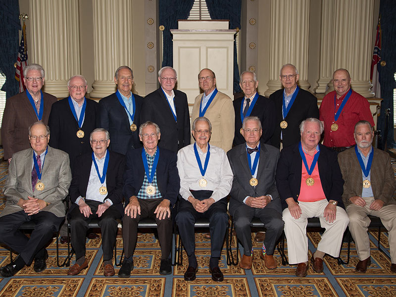 During the weekend reunion of medical students Class of 1968 a Golden Grads Ceremony event at the Old Capitol Museum, August 25, were they were recognized with a medallion. Class members included, seated from left, are Dr. Park Chittom, Dr. Charlie Elliott, Dr. Stephen Felts, Dr. Marvin Girod, Dr. Thomas Glasgow, Dr. Mack Gorton and Dr. D.I. Wright, Standing from left are; Dr. Stanley Hartness, Dr. Fred Ingram, Dr. Arther Jones, Dr. John Paul Lee, Dr. Pat (W.J.) Patterson, Dr. David Powell, Dr. Gerald Robertson and Dr. John Summers.