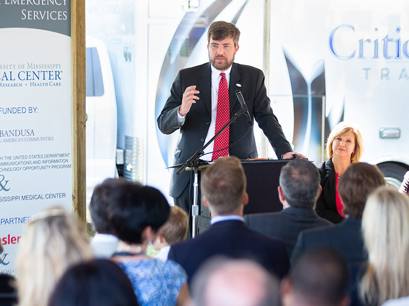 Dr. Damon Darsey, associate professor of emergency medicine and medical director of the Mississippi Center for Emergency Services, explains the center's mission during groundbreaking ceremonies.