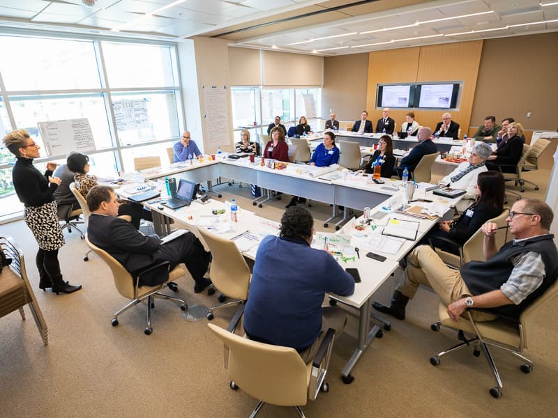 Leaders from across UMMC gather in a conference room for change management training.