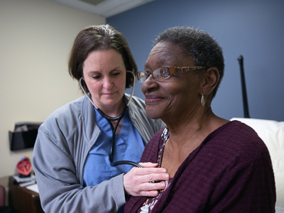 Julia Ann Flowers of Kilmichael gets a check from Dr. Kellan Ashley on her follow-up appointment for a procedure to correct her mitral valve function.