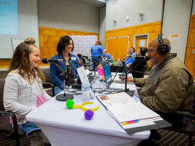 Magnolia "Maggie" Jones and mother Emily of Bogue Chitto talk with Steve Michaels of Blues 93.1.