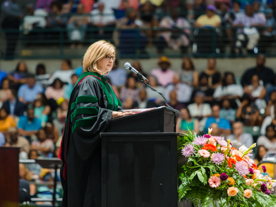 Dr. Woodward speaking at the 2019 commencement ceremony.