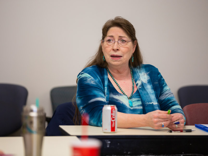 Sue Ann Meng leads a recent meeting of an Alzheimer's support group at UMMC.