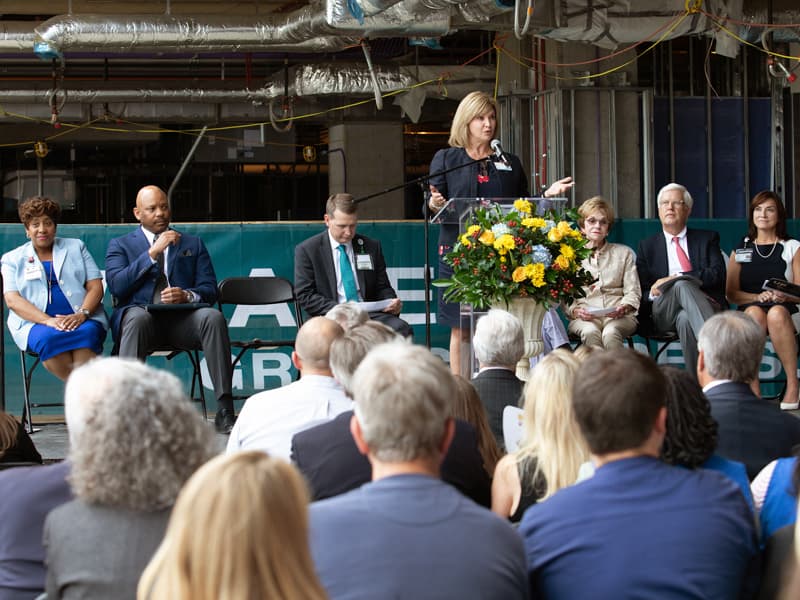 Vice Chancellor Dr. LouAnn Woodward thanks supporters of UMMC's pediatric expansion during the project's topping-out ceremony June 27.