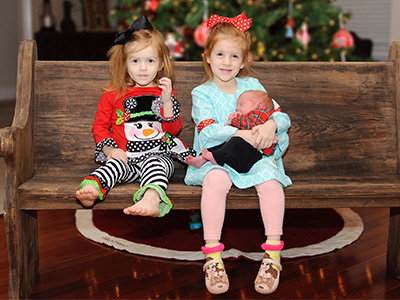 Hand’s children are, from left, Kaylee, Alexis and baby Wynne.