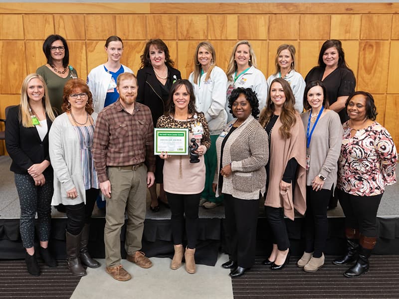 Nominees for the DAISY Nurse Leader Award are, front row, from left, Paige Dimacco, Kaye Flanagin, Bill Brister, LeAnn Harcharik, Joy Akanji, Briana Petty, Alice Chaney Herndon and Sonja Huntley; and back row, from left, Anita Vanderford, Martha Holmes, Patricia Freeman, Slay Jeffords, Becky Harrison, Ann Adams Downs and Lori Oxley.