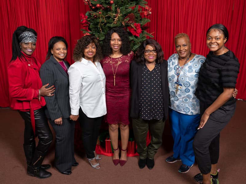 From left to right, make-up artist Shirley Lockett, Cassie King, Cynthia Lewis, Dwanda Moore, Audrey Smiley, Janice Johnson and Brie Kemp of Bonita Wig Boutique.