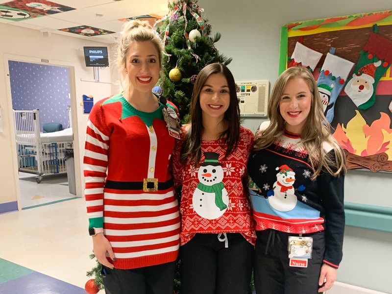 Photos Holiday sweater competition runs gamut from festive to tacky University of Mississippi Medical Center