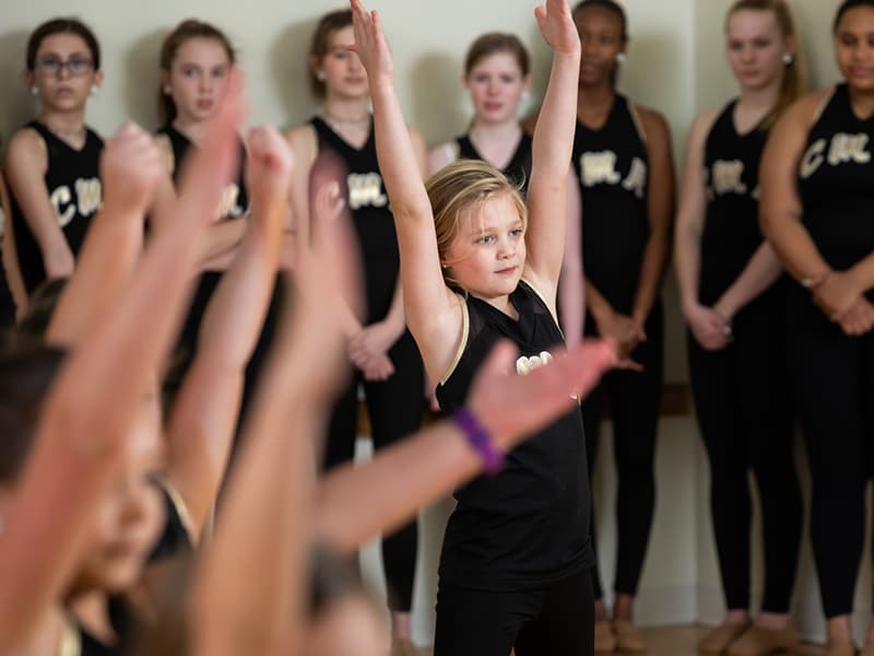 Sybil is shown in one of the routines she and her fellow dancers perform.