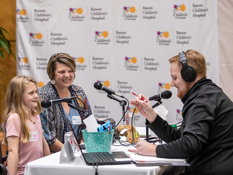 Q101's Ryan Johnson interviews Children's of Mississippi patient and this year's Children's Miracle Network Hospitals Champion Sybil Cumberland and her mom, Tara Cumberland of Preston.
