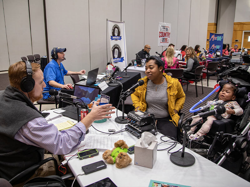 Gerica Hill tells Q101's Ryan Johnson of daughter Gracen O'Harrell's medical journey during Mississippi Miracles Radiothon.