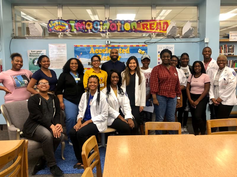 A meeting of the Murrah Pharmacy Club is shown in this photo from Fizer's and Washington's high school years.