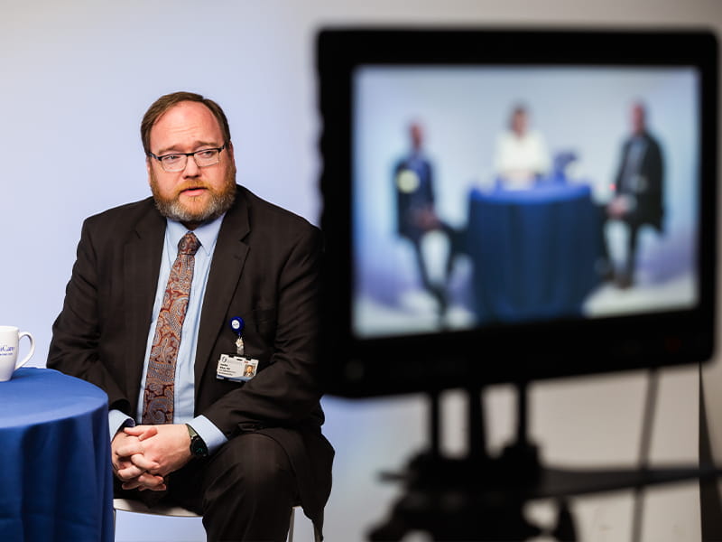 Dr. Jonathan Wilson, UMMC chief administrative officer, keeps Medical Center students and employees abreast of COVID-19 response plans by taking part in virtual town hall meetings led by Dr. LouAnn Woodward, vice chancellor for health affairs and dean of the School of Medicine.