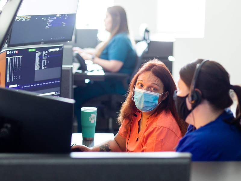 Samantha Tucker, left, communications specialist, and Lauren Russell, R.N., are among the staff at Mississippi MED-COM, which mobilizes emergency responders and health care providers, along with resources, wherever they're needed in the state.