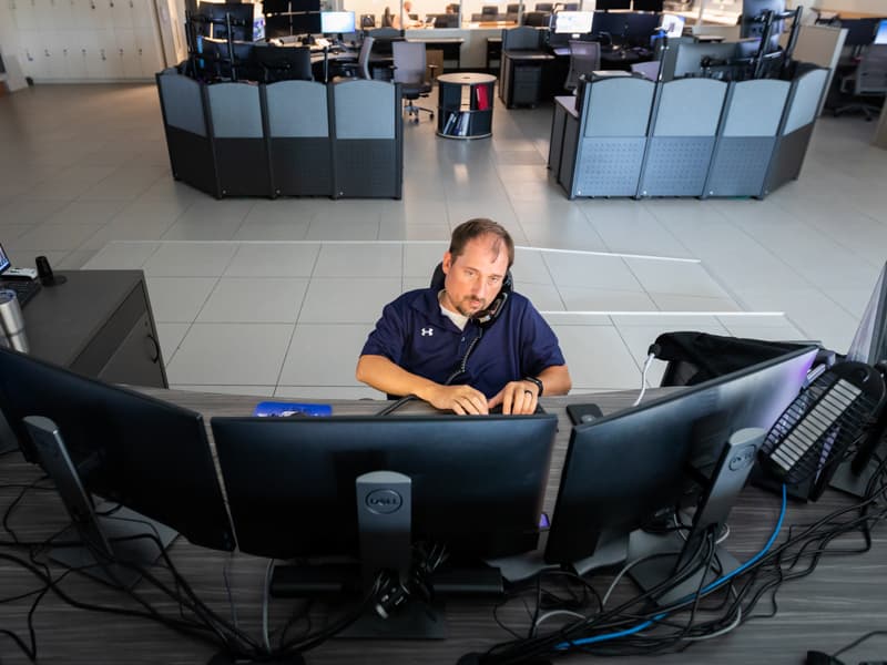 Ben Corcoran, communications specialist, is one of the MED-COM staffers who helps deploy resources and emergency responders to areas in need.