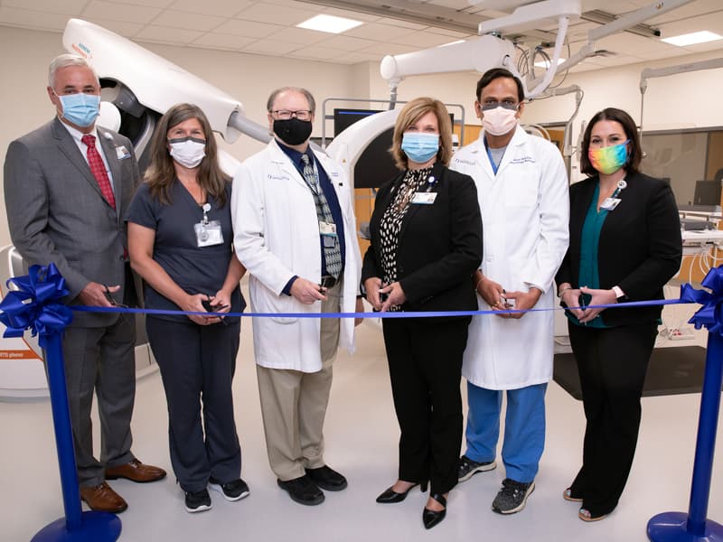 On hand for the Interventional Radiology Suite's ribbon-cutting ceremony are, from left, Britt Crewse, chief executive officer of UMMC's adult hospitals; Becky Wixson, cardio-interventional imaging supervisor; McCowan; Dr. LouAnn Woodward, UMMC vice chancellor for health affairs; Patel; and Ashley Jones Burns, imaging services director.