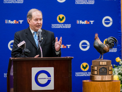 Century Club Charities President Pat Busby is shown speaking during the presentation of a tournament donation to benefit Children's of Mississippi.