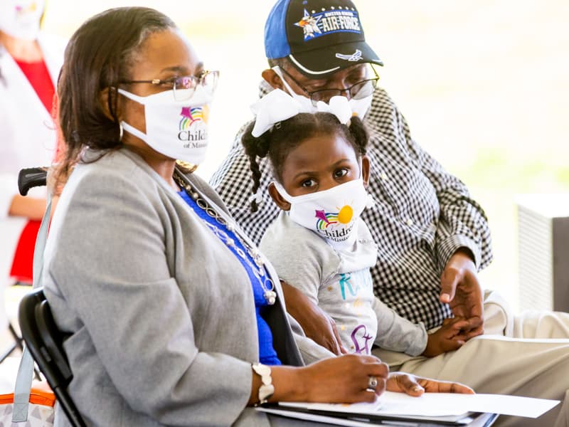 Miracle Brown, who spent the first 13 months of her life in neonatal intensive care at Children's of Mississippi, sits by her grandparents, Aretha and Larry Edwards.