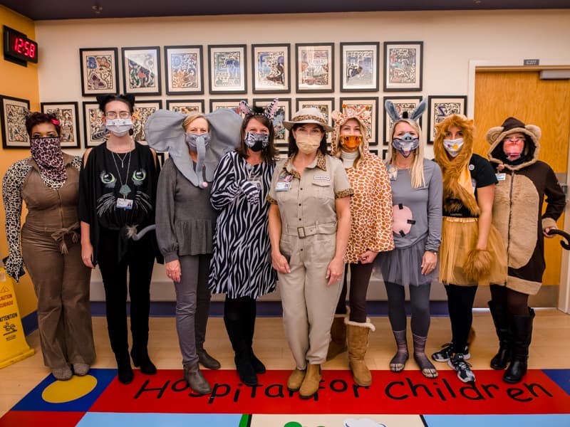 The “Zoo Crew” from the Department of Pediatrics includes, from left, Shanda Barrett, Cali Foreman, Louise Dove, Natalie Hutto, Dr. Mary Taylor, Shannon Hoover, Katie Sanders and Selena Daniel.