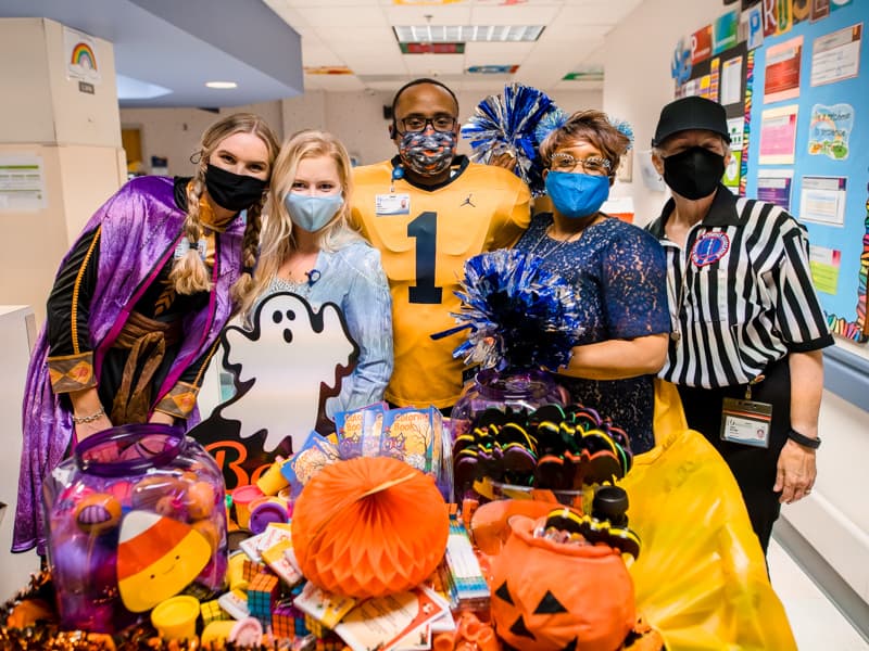Bringing Halloween fun to Children's of Mississippi patients are, from left Avery Parman, Anna Peoples, hospital chaplain Mark Gilbert, Director of Pastoral Services Doris Whitaker and hospital chaplain Linda McComb.