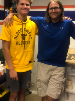 Jack Houston, left, is pictured with Madison Central High football team trainer Josh Hardin, who is credited with saving Jack's life after he experienced cardiac arrest.