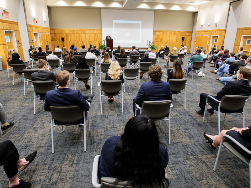 A socially-distanced audience hears Dr. Kenneth Bennett present the Last Lecture last Wednesday in the Student Union.