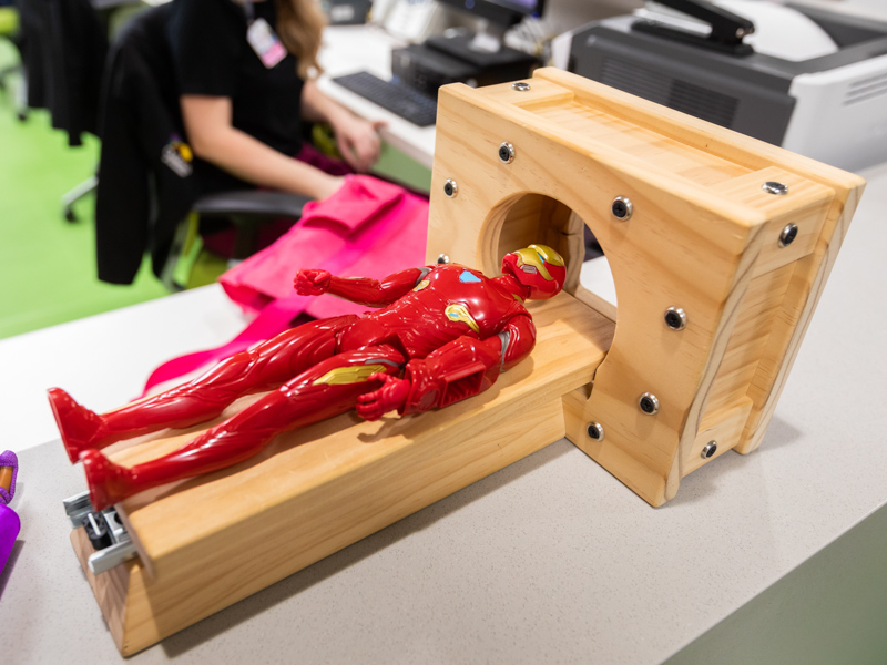 Ironman and a model MRI machine can help children understand what will happen when they get a scan.