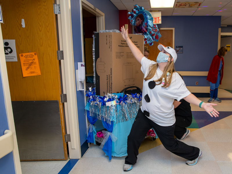 "Olaf," aka child life specialist Courtney Easterday, greets a Children's of Mississippi patient during the Thanksgiving Parade Nov. 22.