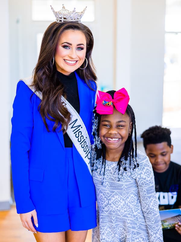 Children's Miracle Network Hospitals Champion Nolee is beaming beside Miss Mississippi Holly Brand.