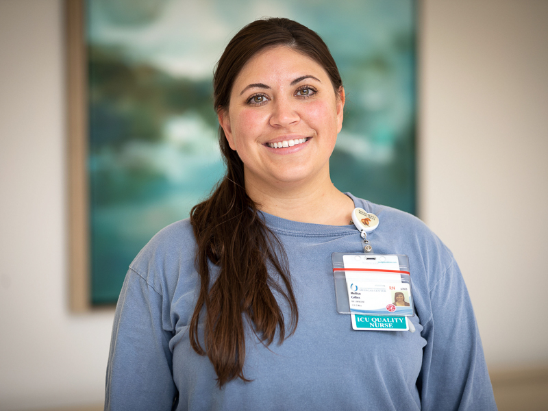 Registered nurse Mellisa Collins cares for patients in the Medical ICU.